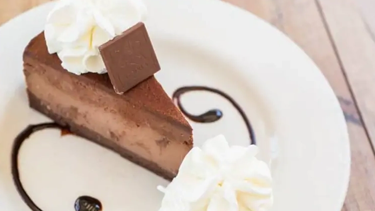 Godiva Chocolate Cheesecake Slice with Whip Cream Godiva Chocolate Cheesecake Slice with Whip Cream - Image 1