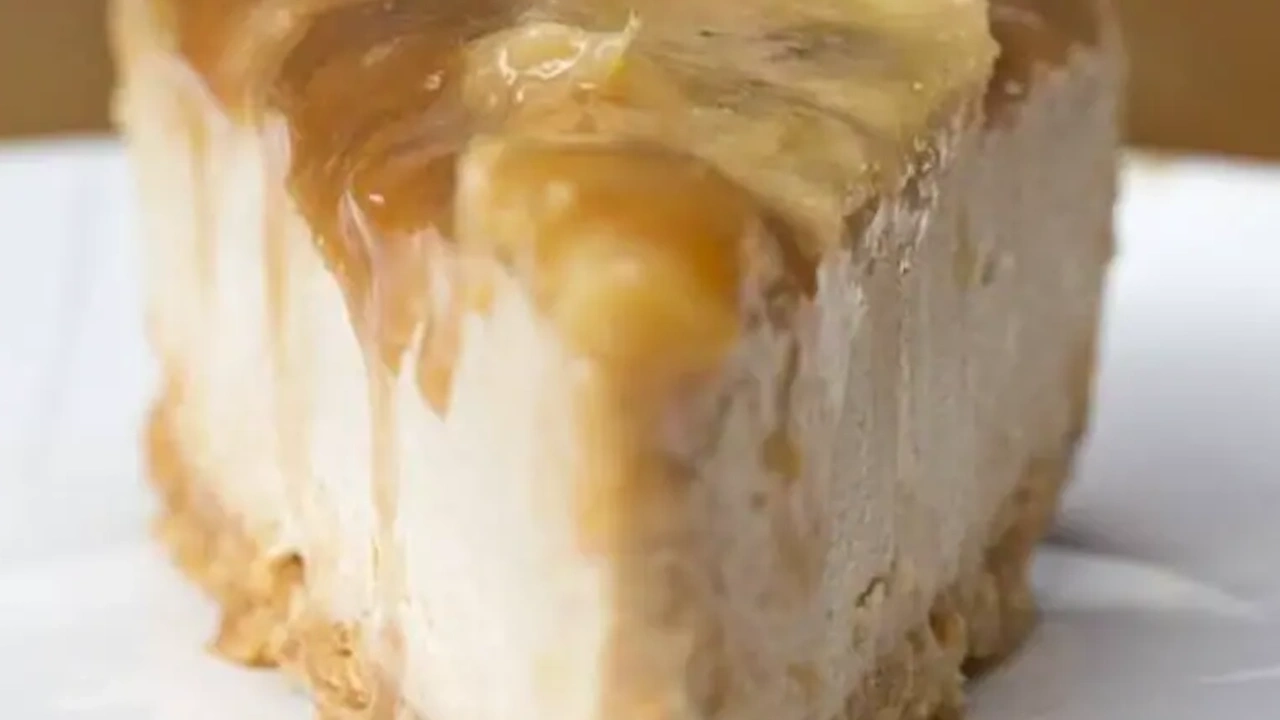 X-Large Reese's Peanut Butter Cheesecake Slice with Whip Cream X-Large Reese's Peanut Butter Cheesecake Slice with Whip Cream - Image 1